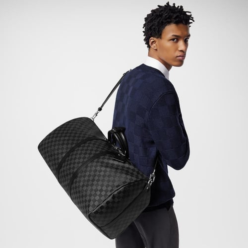 حقيبة السفر Keepall 55 بحزام للكتف