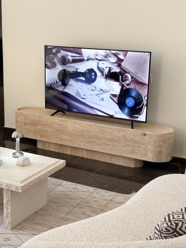 طاوله تي في من الرخام tv