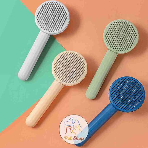 مشط شعر للقطط والكلاب شكل دائري ضغاط قابل لازالة ا...
