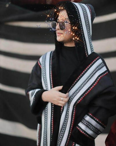 فروة اطفال سدو اسود بالاسم