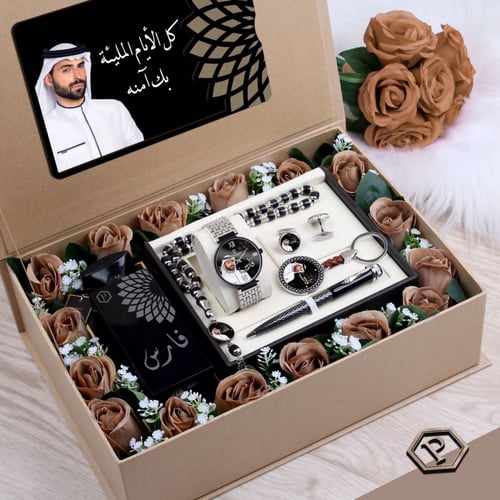 هدية رجالية راقية مزينة بورد أنيق وتشمل ساعة مع مج...