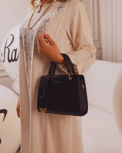 شنطة نسائية أنيقة جلد بلون أسود