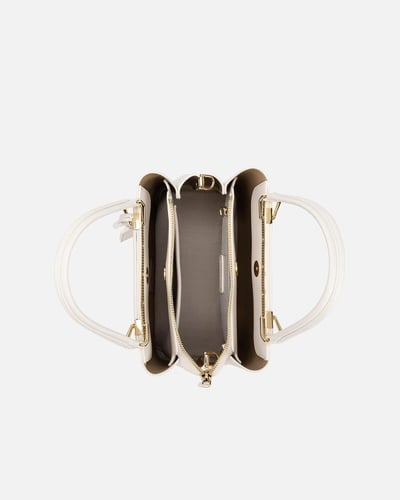 شنط نسائية لكل يوم بلون أبيض