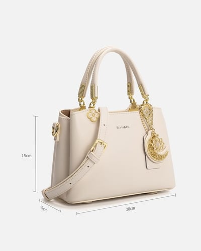 شنطة نسائية باللون الأبيض