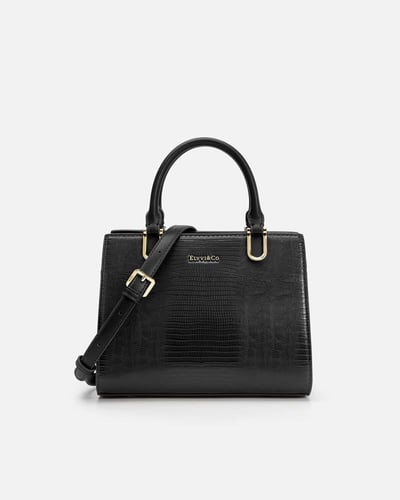 شنطة نسائية كلاسيك جلد بلون أسود