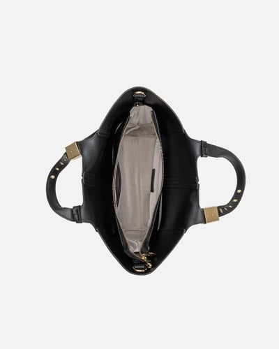 شنطة نسائية جلد حيث تلتقي الأناقة بالبساطة