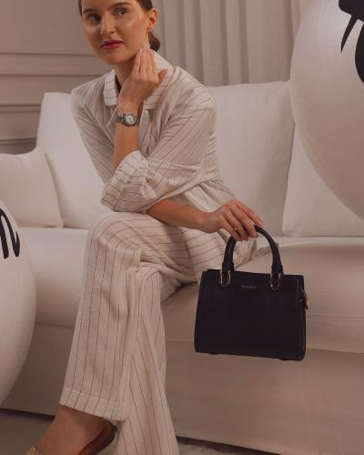 شنطة نسائية كلاسيك جلد بلون أسود