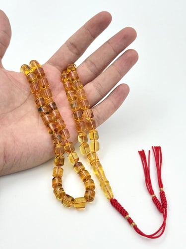 سبحة كهرمان طبيعي عسلي شفاف صندوقي