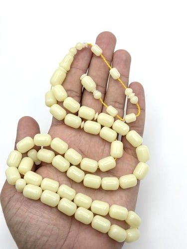 سبحة ضومنة كريمي برميلي