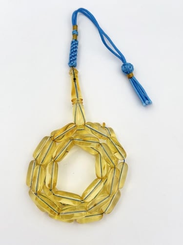 سبحة كهرمان طبيعي شفاف صنوبري