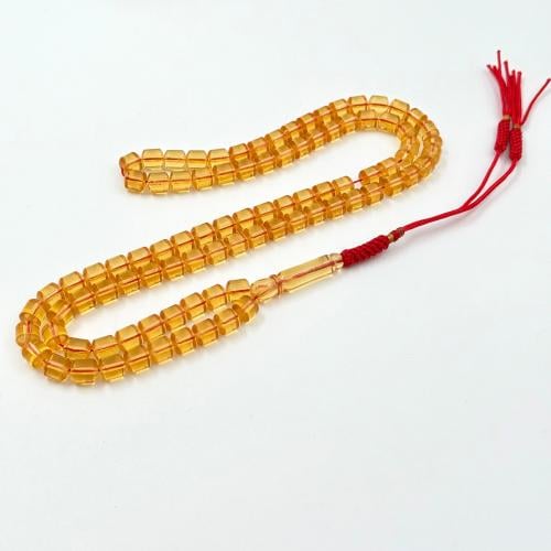 سبحة مستكة شبيه الكهرمان الشفاف