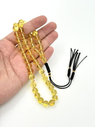 سبحة كهرمان شفاف طبيعي دائري