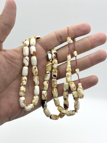 سبحة كهرمان طبيعي كبس