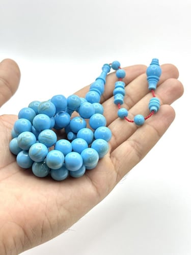 سبحة بكلايت أزرق فاتح بعروق ذهبية