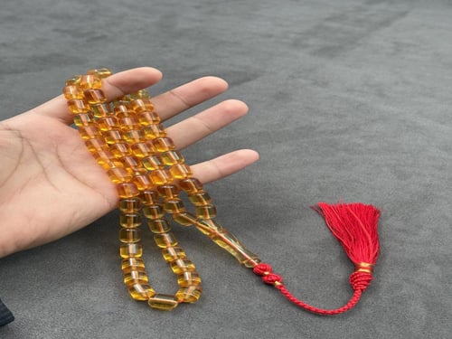 سبحة مستكة شبيه الكهرمان الشفاف