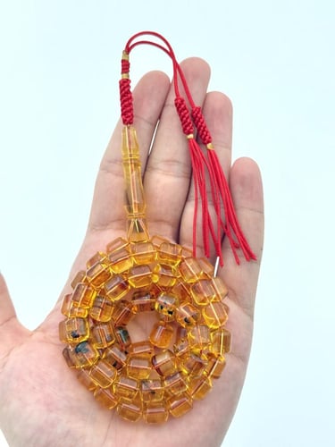 سبحة كهرمان طبيعي عسلي شفاف صندوقي