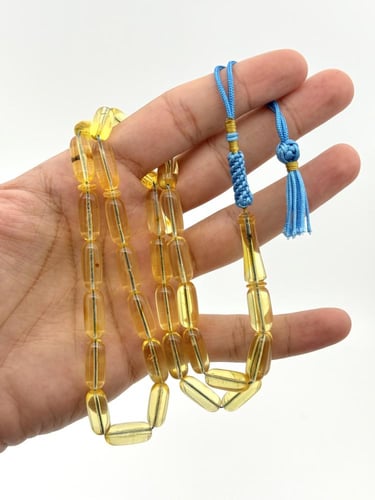 سبحة كهرمان طبيعي شفاف صنوبري