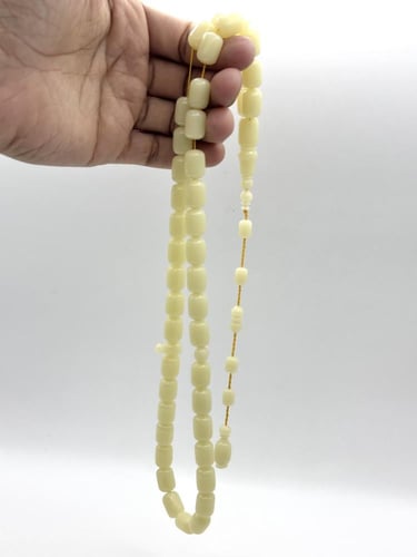 سبحة ضومنة كريمي برميلي