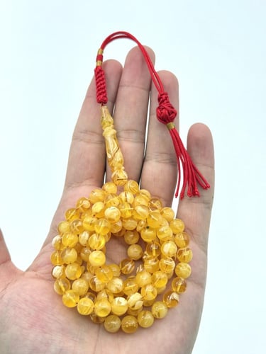 سبحة مستكة شبيه الكهرمان 99 خرزة