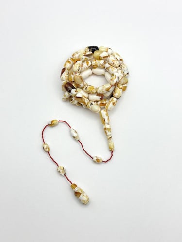 سبحة كهرمان طبيعي كبس