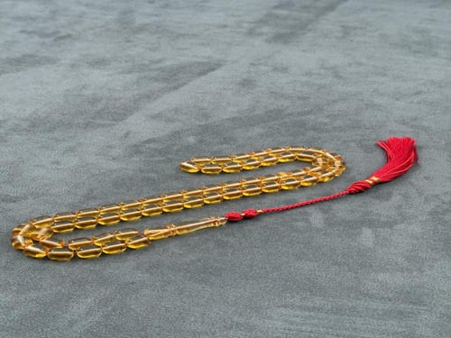 سبحة مستكة شبيه الكهرمان الشفاف