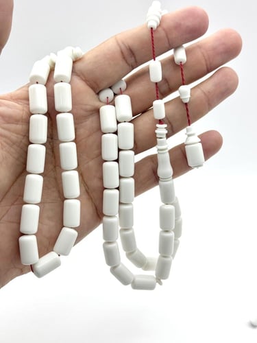 سبحة ضومنة أبيض كبسولة