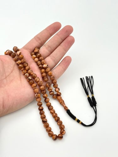 سبحة فاتوران بني مموج 99 خرزة