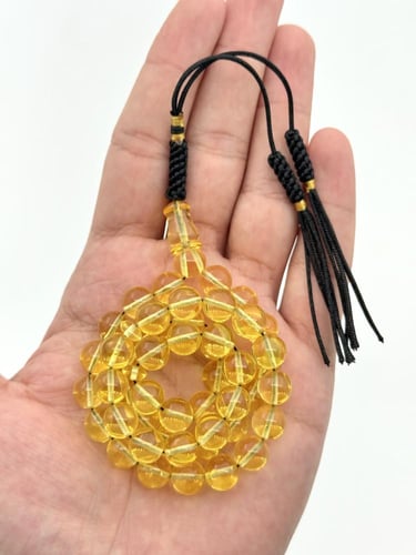 سبحة كهرمان شفاف طبيعي دائري