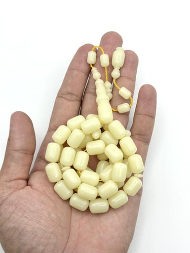 سبحة ضومنة كريمي برميلي