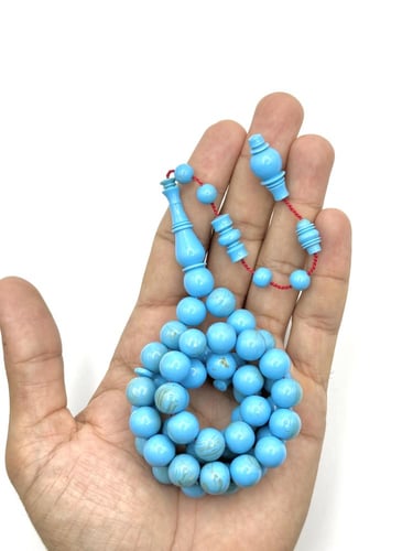 سبحة بكلايت أزرق فاتح بعروق ذهبية