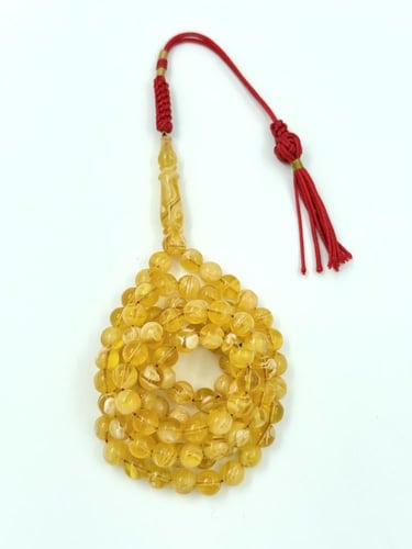 سبحة مستكة شبيه الكهرمان 99 خرزة