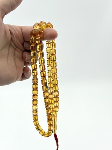 سبحة كهرمان طبيعي عسلي شفاف صندوقي