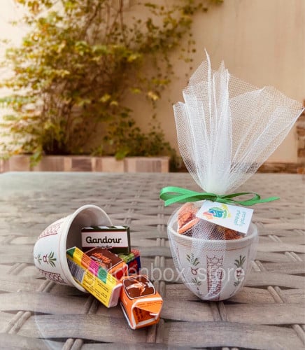 فنجان قهوة مع تعبئة وتغليف