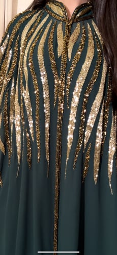 جلابيه شيفون مشغولة بالشك اليدوي باللون الزيتي