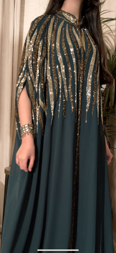 جلابيه شيفون مشغولة بالشك اليدوي باللون الزيتي