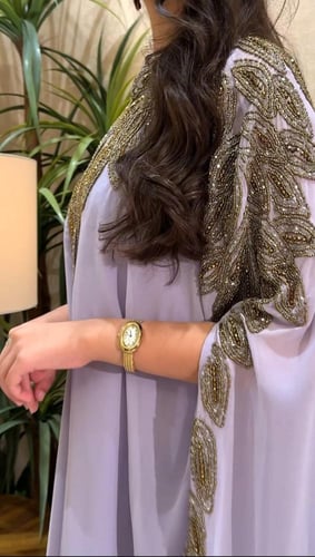 جلابيه مع فستان داخلي مشغوله بالشك اليدوي الفاخر ب...