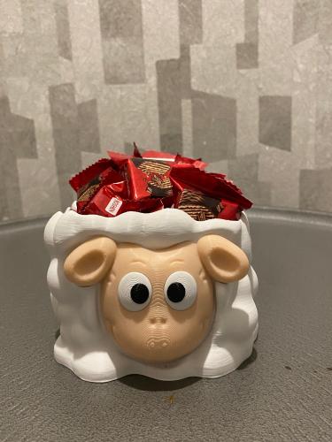 A box of chocolates in the shape of a cute sheep, perfect for gifts, occasions, or even decorating the table in a special way. Fil...