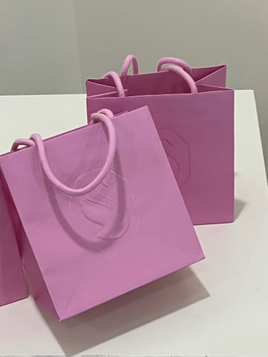 كيس وردي بشعار سوارفسكي