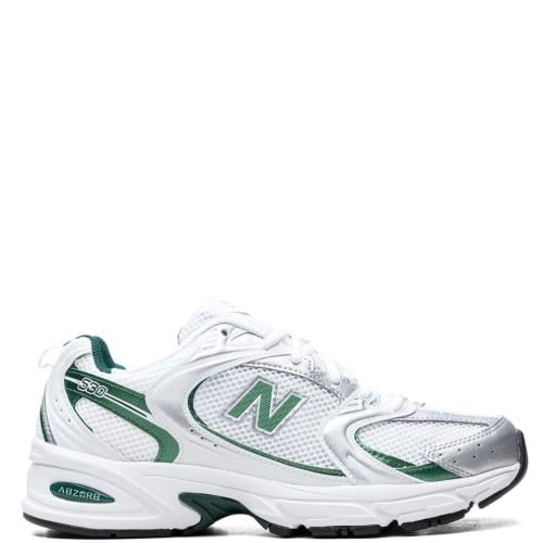 New Balance 530 trainers in white & green