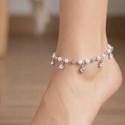 Elegant and delicate anklet studded with zircon. T...