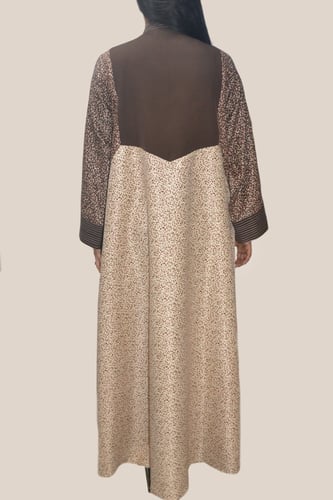 جلابية بني منقط