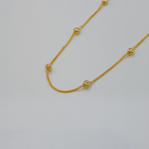 عقد كرات ذهب عيار 21