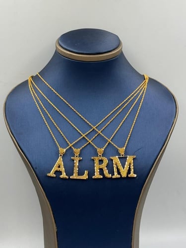 سلسال وتعليقة حرف - Necklaces 21K