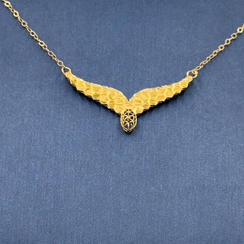 عقد جناح الصقر ذهب عيار 21