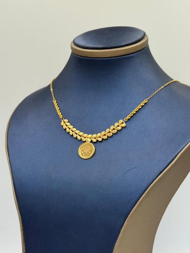 عقد جنيهات ذهب عيار 21