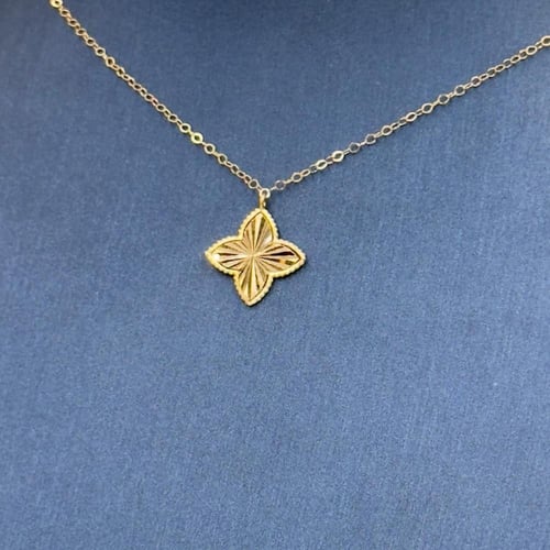 عقد تصميم عالمي ذهب عيار 21