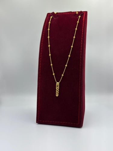 عقد تصميم عالمي ذهب عيار 21