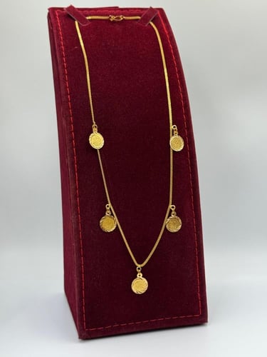 عقد جنيهات ذهب عيار 21