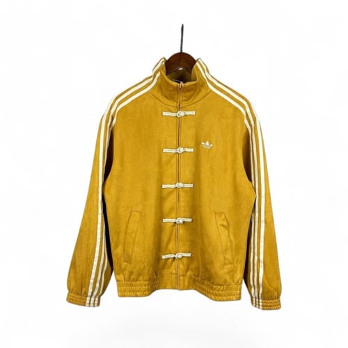 جاكت اديداس نسخة السنة الصينية الجديدة