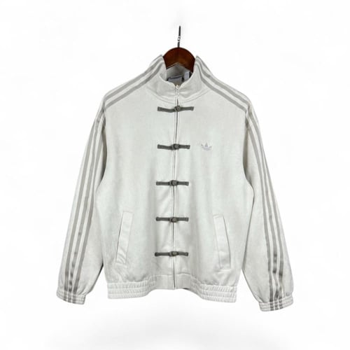 جاكت اديداس نسخة السنة الصينية الجديدة